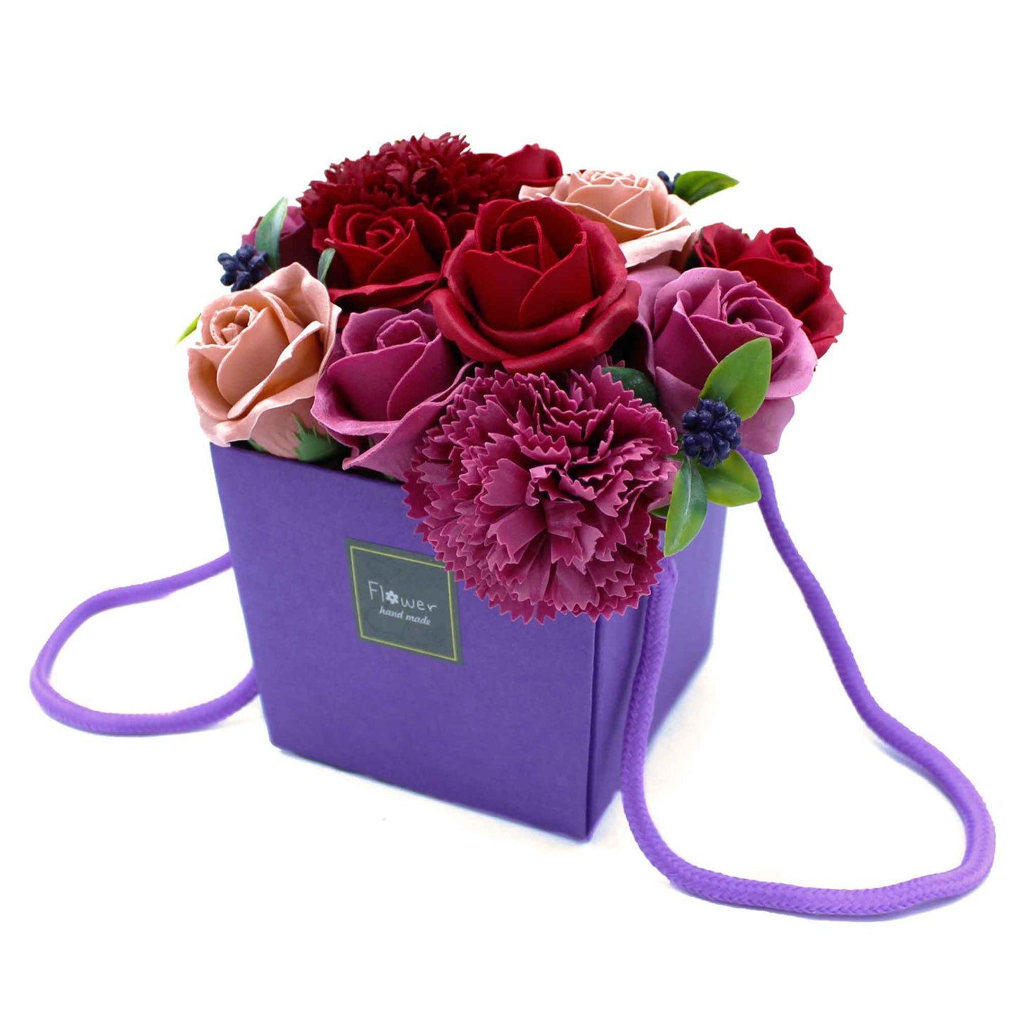 Boeket van rode zeepbloemen in doosje, rechtop geplaatst zoals in een vaas