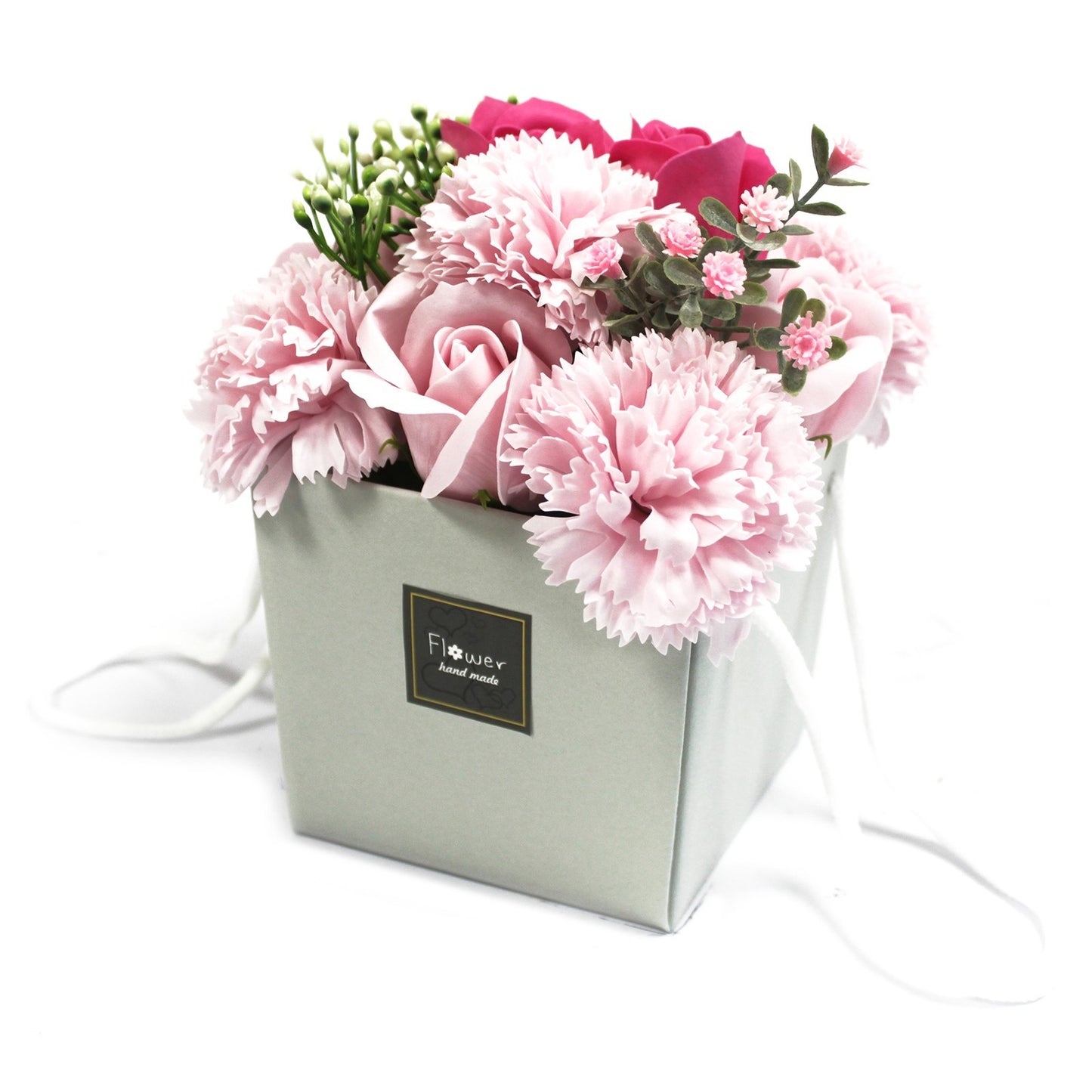 Boeket van roze zeepbloemen in doosje, rechtop geplaatst zoals in een vaas