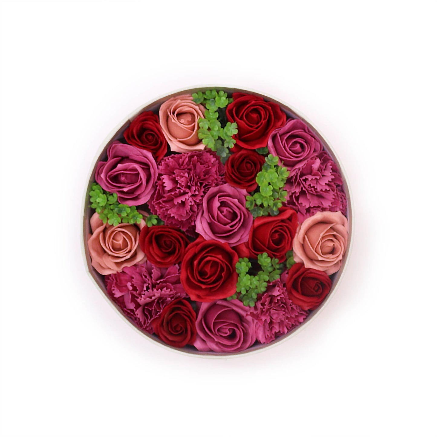 Ronde open doos met rode zeepbloemen van roos en anjer